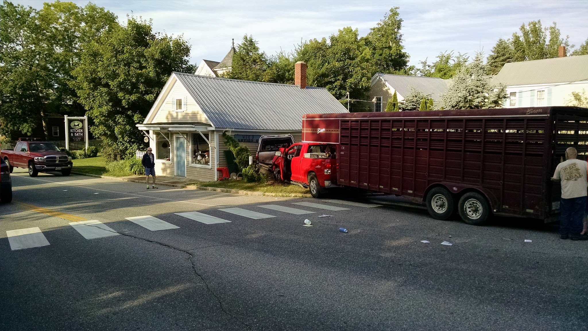 Two truck crash causes damage to building in Bridgton
