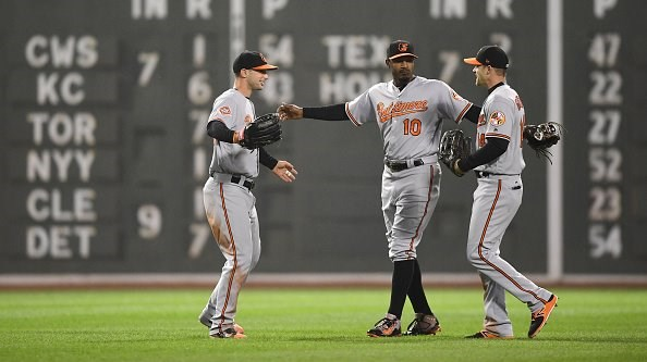 Baltimore Orioles Adam Jones celebrates with fans after the